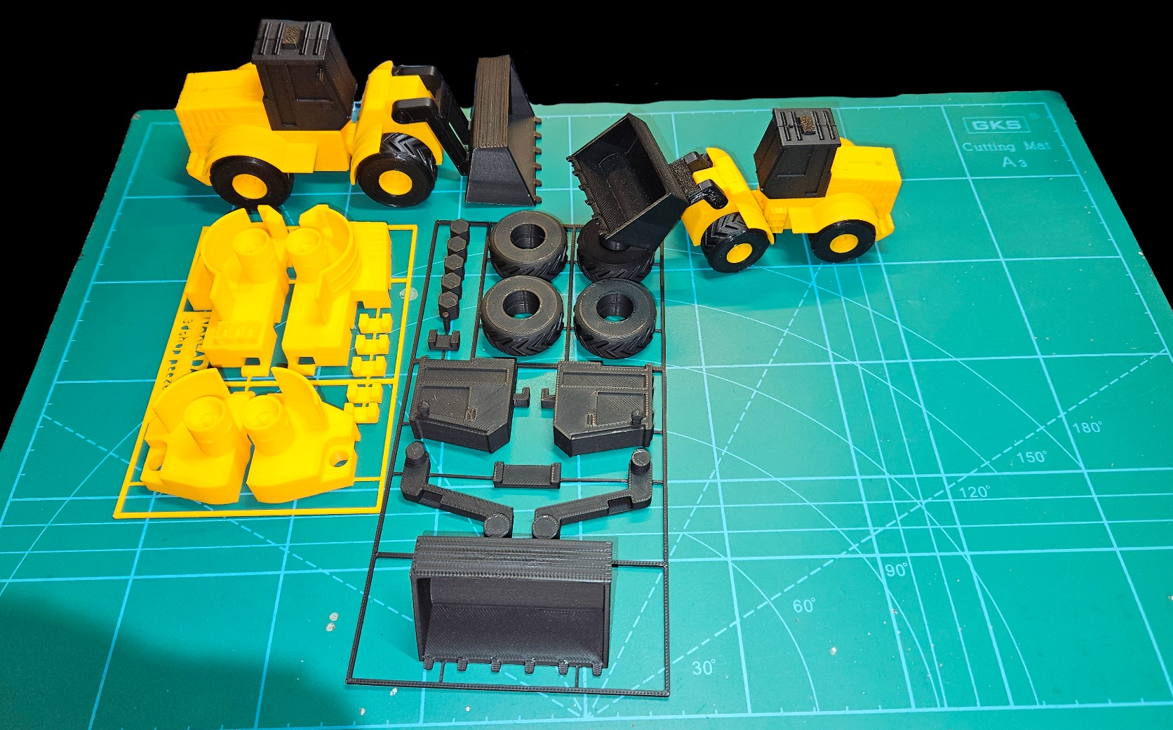 Tractor con pala frontal — kit armable